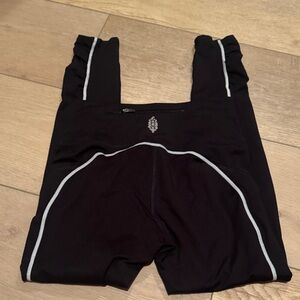 Free People Black leggings with White Accents. Pockets. Like new.